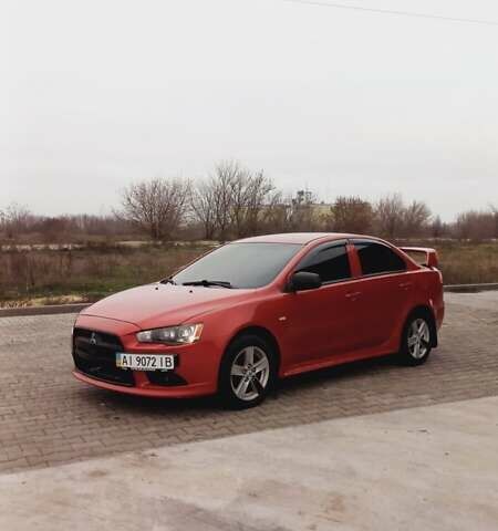 Красный Мицубиси Лансер, объемом двигателя 2 л и пробегом 200 тыс. км за 6000 $, фото 2 на Automoto.ua