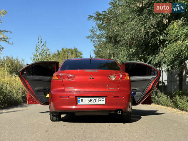 Красный Мицубиси Лансер, объемом двигателя 1.5 л и пробегом 265 тыс. км за 6200 $, фото 11 на Automoto.ua