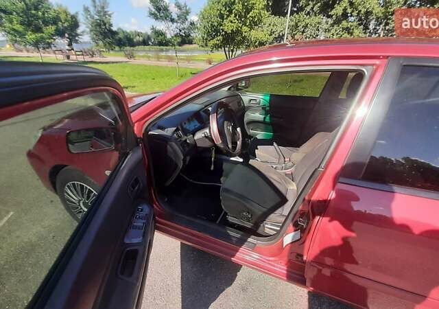 Червоний Міцубісі Lancer, об'ємом двигуна 1.6 л та пробігом 195 тис. км за 5500 $, фото 5 на Automoto.ua