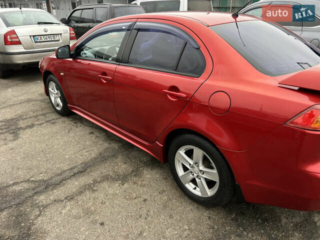 Красный Мицубиси Лансер, объемом двигателя 2 л и пробегом 330 тыс. км за 5250 $, фото 14 на Automoto.ua