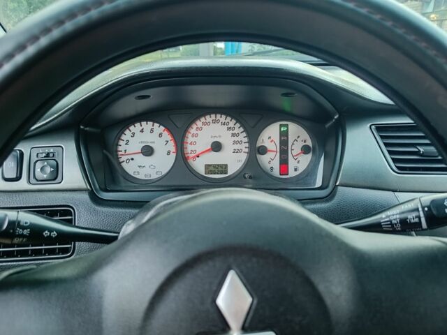 Червоний Міцубісі Lancer, об'ємом двигуна 1.6 л та пробігом 227 тис. км за 5300 $, фото 7 на Automoto.ua