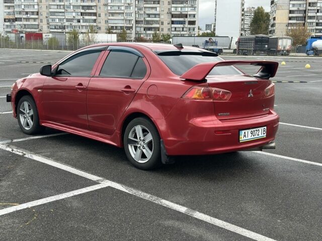 Мицубиси Лансер 2008 в Киеве на Automoto.ua Красный Мицубиси Лансер, объемом двигателя 2 л и пробегом 247 тыс. км за 5400 $, фото 6 на Automoto.ua