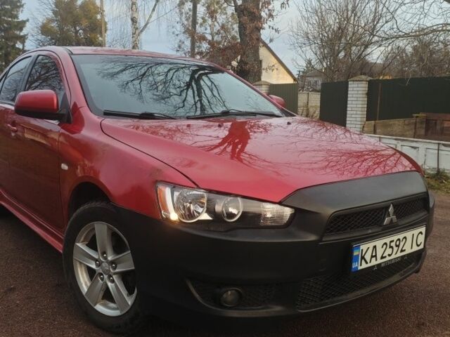 Червоний Міцубісі Lancer, об'ємом двигуна 2 л та пробігом 300 тис. км за 3950 $, фото 3 на Automoto.ua