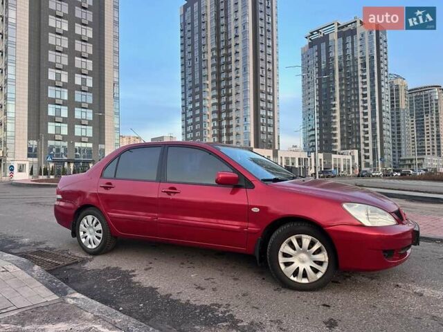 Червоний Міцубісі Lancer, об'ємом двигуна 1.6 л та пробігом 141 тис. км за 4700 $, фото 4 на Automoto.ua
