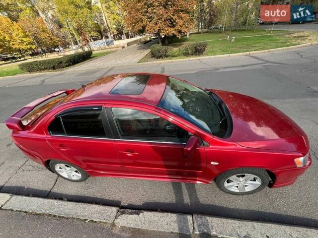 Мицубиси Лансер 2008 в Николаеве на Automoto.ua Красный Мицубиси Лансер, объемом двигателя 1.5 л и пробегом 120 тыс. км за 7000 $, фото 8 на Automoto.ua