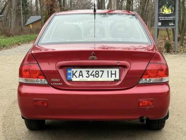 Червоний Міцубісі Lancer, об'ємом двигуна 1.6 л та пробігом 220 тис. км за 4600 $, фото 11 на Automoto.ua