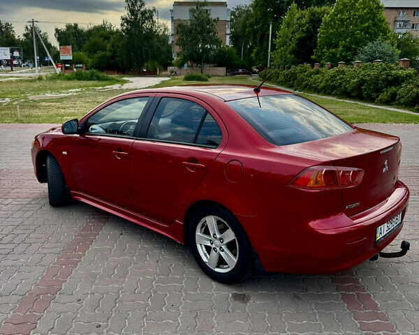Красный Мицубиси Лансер, объемом двигателя 2 л и пробегом 365 тыс. км за 5000 $, фото 2 на Automoto.ua