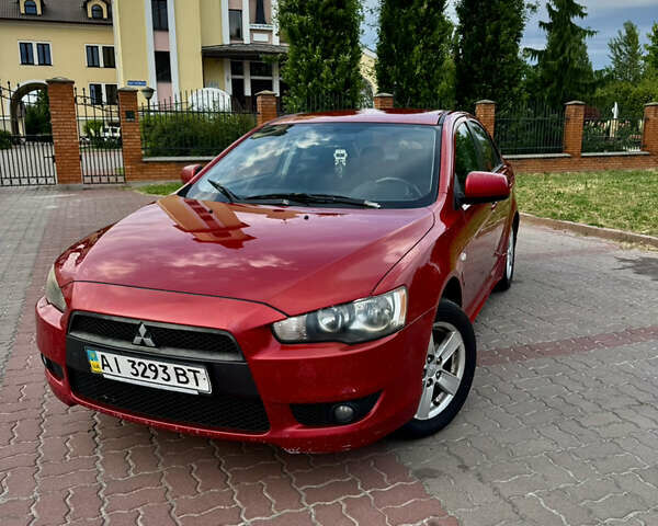 Красный Мицубиси Лансер, объемом двигателя 2 л и пробегом 365 тыс. км за 5000 $, фото 6 на Automoto.ua