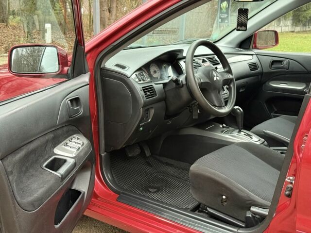 Червоний Міцубісі Lancer, об'ємом двигуна 1.6 л та пробігом 220 тис. км за 4600 $, фото 12 на Automoto.ua