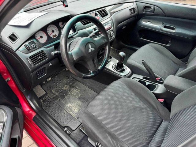 Красный Мицубиси Лансер, объемом двигателя 1.6 л и пробегом 215 тыс. км за 4500 $, фото 12 на Automoto.ua