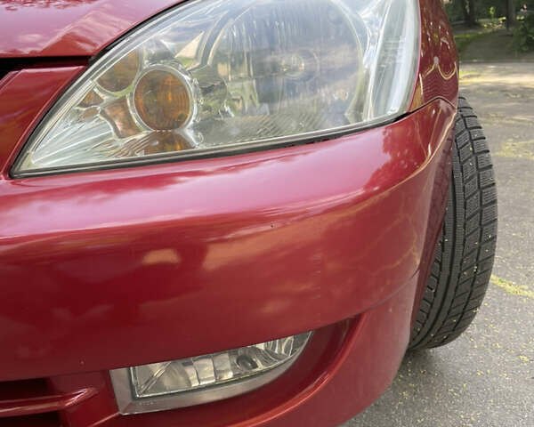 Червоний Міцубісі Lancer, об'ємом двигуна 1.6 л та пробігом 270 тис. км за 5699 $, фото 24 на Automoto.ua