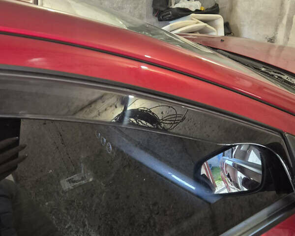 Красный Мицубиси Лансер, объемом двигателя 2 л и пробегом 65 тыс. км за 9300 $, фото 16 на Automoto.ua