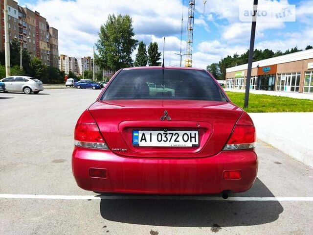 Червоний Міцубісі Lancer, об'ємом двигуна 1.6 л та пробігом 270 тис. км за 3999 $, фото 1 на Automoto.ua