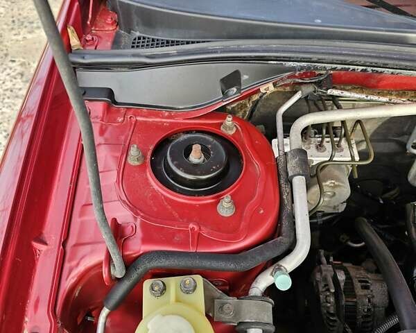 Червоний Міцубісі Lancer, об'ємом двигуна 1.6 л та пробігом 220 тис. км за 5800 $, фото 14 на Automoto.ua