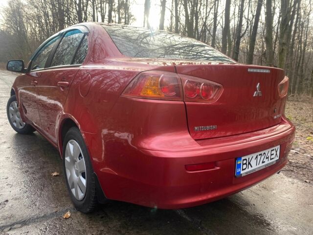 Червоний Міцубісі Lancer, об'ємом двигуна 0 л та пробігом 124 тис. км за 7555 $, фото 7 на Automoto.ua