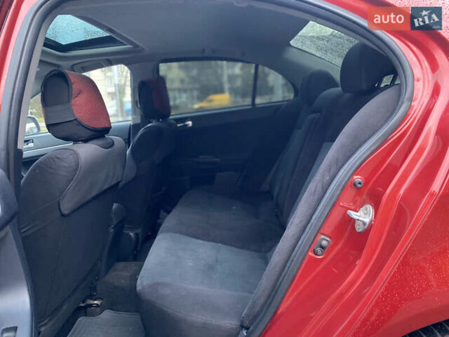 Красный Мицубиси Лансер, объемом двигателя 1.5 л и пробегом 120 тыс. км за 7699 $, фото 7 на Automoto.ua