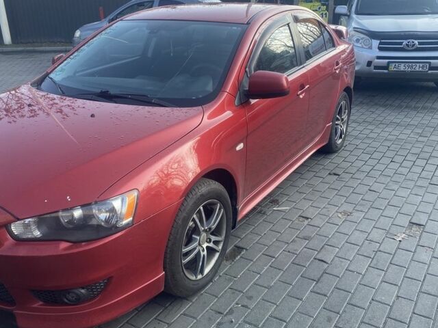 Червоний Міцубісі Lancer, об'ємом двигуна 2 л та пробігом 200 тис. км за 5350 $, фото 1 на Automoto.ua