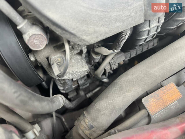 Червоний Міцубісі Lancer, об'ємом двигуна 2 л та пробігом 203 тис. км за 8000 $, фото 34 на Automoto.ua