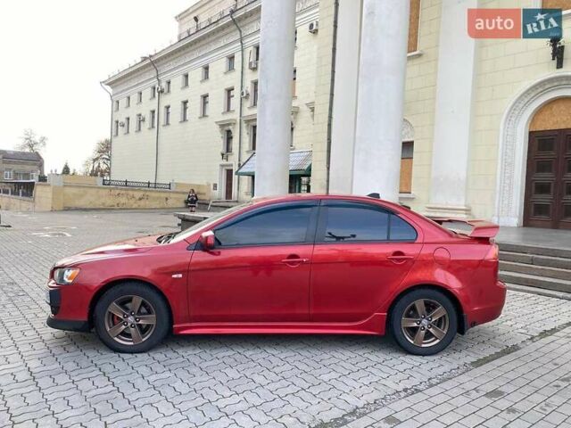 Красный Мицубиси Лансер, объемом двигателя 2 л и пробегом 250 тыс. км за 5600 $, фото 6 на Automoto.ua