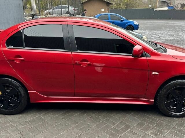 Червоний Міцубісі Lancer, об'ємом двигуна 2 л та пробігом 137 тис. км за 8500 $, фото 3 на Automoto.ua