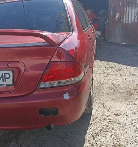 Мицубиси Лансер 2008 в Львове на Automoto.ua Красный Мицубиси Лансер, объемом двигателя 1.58 л и пробегом 280 тыс. км за 3200 $, фото 19 на Automoto.ua