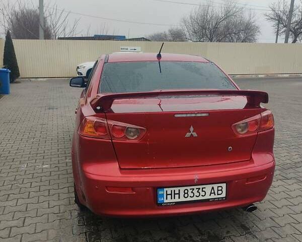 Красный Мицубиси Лансер, объемом двигателя 2 л и пробегом 174 тыс. км за 7150 $, фото 4 на Automoto.ua