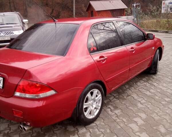 Червоний Міцубісі Lancer, об'ємом двигуна 1.6 л та пробігом 191 тис. км за 4900 $, фото 2 на Automoto.ua