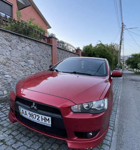 Міцубісі Lancer 2008 у Києві на Automoto.ua Червоний Міцубісі Lancer, об'ємом двигуна 2 л та пробігом 250 тис. км за 7000 $, фото 7 на Automoto.ua