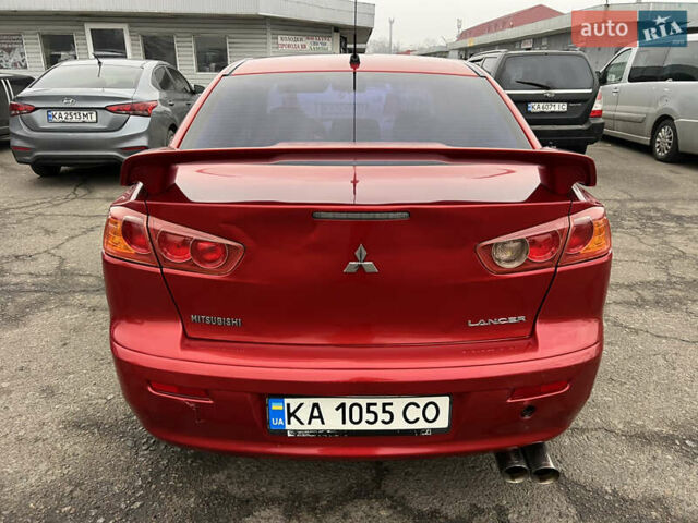 Красный Мицубиси Лансер, объемом двигателя 2 л и пробегом 330 тыс. км за 5250 $, фото 9 на Automoto.ua
