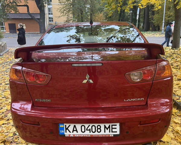 Червоний Міцубісі Lancer, об'ємом двигуна 2 л та пробігом 203 тис. км за 8000 $, фото 12 на Automoto.ua