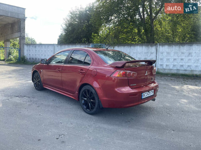 Червоний Міцубісі Lancer, об'ємом двигуна 2 л та пробігом 179 тис. км за 6499 $, фото 2 на Automoto.ua