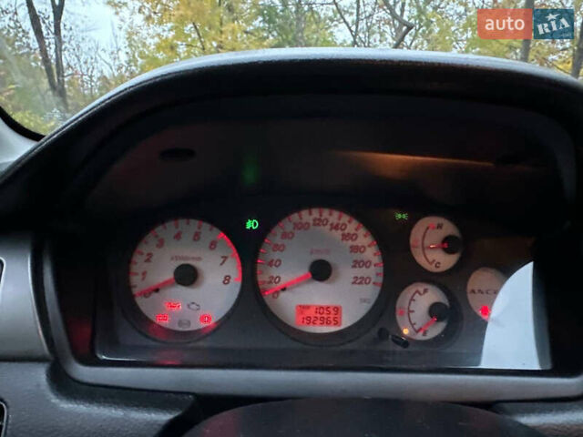 Красный Мицубиси Лансер, объемом двигателя 1.6 л и пробегом 192 тыс. км за 5999 $, фото 11 на Automoto.ua