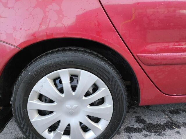 Червоний Міцубісі Lancer, об'ємом двигуна 1.6 л та пробігом 140 тис. км за 6000 $, фото 9 на Automoto.ua