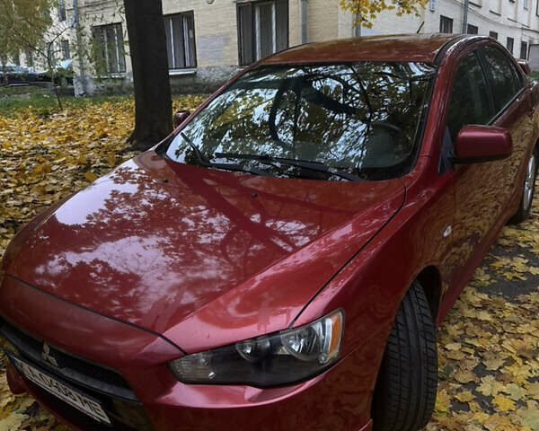 Червоний Міцубісі Lancer, об'ємом двигуна 2 л та пробігом 203 тис. км за 8000 $, фото 3 на Automoto.ua