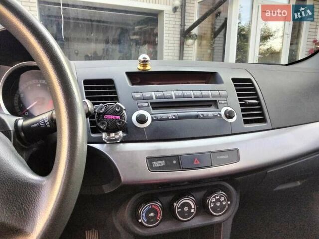 Міцубісі Lancer 2008 у Житомирі на Automoto.ua Червоний Міцубісі Lancer, об'ємом двигуна 1.5 л та пробігом 155 тис. км за 6200 $, фото 11 на Automoto.ua