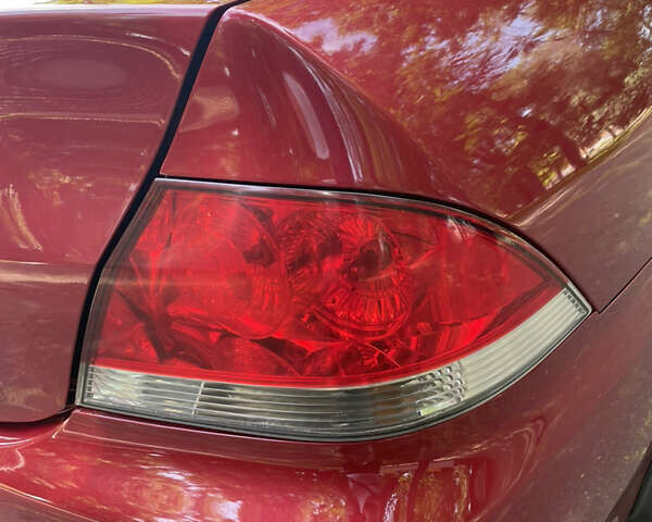 Червоний Міцубісі Lancer, об'ємом двигуна 1.6 л та пробігом 270 тис. км за 5699 $, фото 26 на Automoto.ua