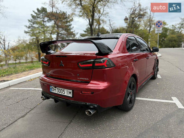 Мицубиси Лансер 2008 в Одессе на Automoto.ua Красный Мицубиси Лансер, объемом двигателя 2 л и пробегом 227 тыс. км за 8000 $, фото 4 на Automoto.ua