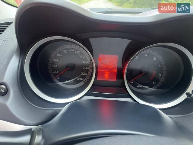 Красный Мицубиси Лансер, объемом двигателя 1.5 л и пробегом 124 тыс. км за 7100 $, фото 7 на Automoto.ua