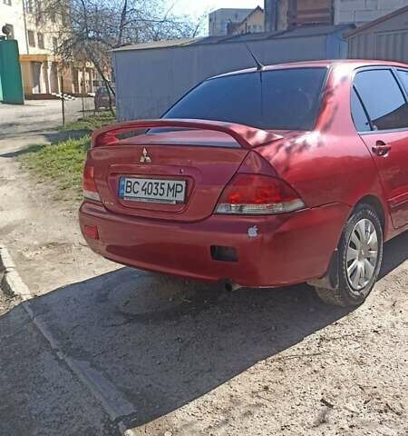 Мицубиси Лансер 2008 в Львове на Automoto.ua Красный Мицубиси Лансер, объемом двигателя 1.58 л и пробегом 280 тыс. км за 3200 $, фото 24 на Automoto.ua