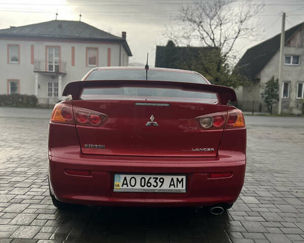 Червоний Міцубісі Lancer, об'ємом двигуна 2 л та пробігом 150 тис. км за 7000 $, фото 4 на Automoto.ua
