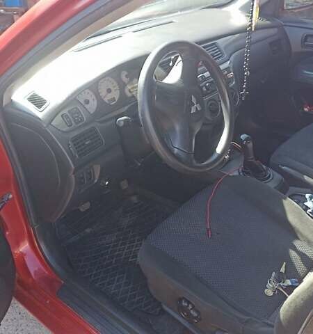 Мицубиси Лансер 2008 в Львове на Automoto.ua Красный Мицубиси Лансер, объемом двигателя 1.58 л и пробегом 280 тыс. км за 3200 $, фото 17 на Automoto.ua