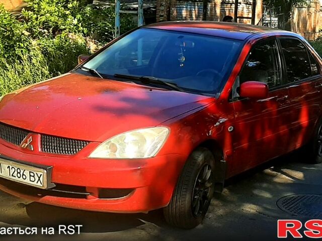 Червоний Міцубісі Lancer, об'ємом двигуна 1.6 л та пробігом 266 тис. км за 2900 $, фото 1 на Automoto.ua