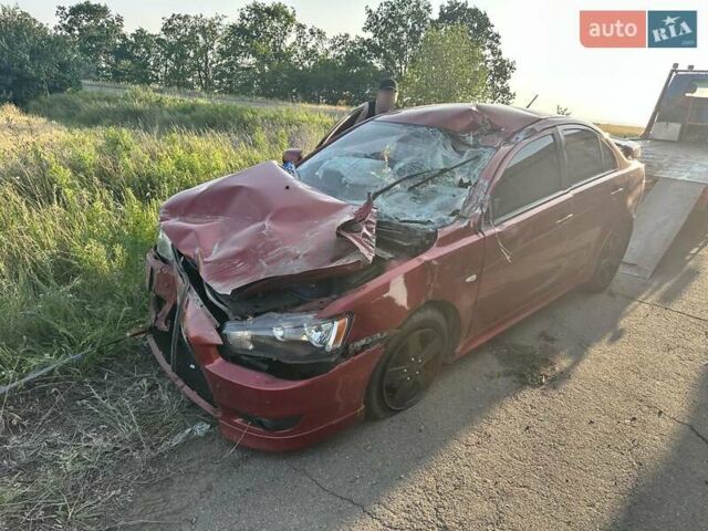 Красный Мицубиси Лансер, объемом двигателя 2 л и пробегом 192 тыс. км за 3000 $, фото 8 на Automoto.ua