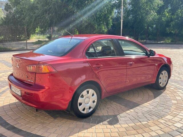 Червоний Міцубісі Lancer, об'ємом двигуна 1.5 л та пробігом 211 тис. км за 6900 $, фото 19 на Automoto.ua