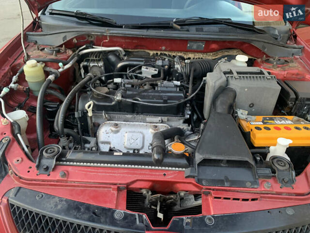 Червоний Міцубісі Lancer, об'ємом двигуна 1.6 л та пробігом 137 тис. км за 4999 $, фото 26 на Automoto.ua