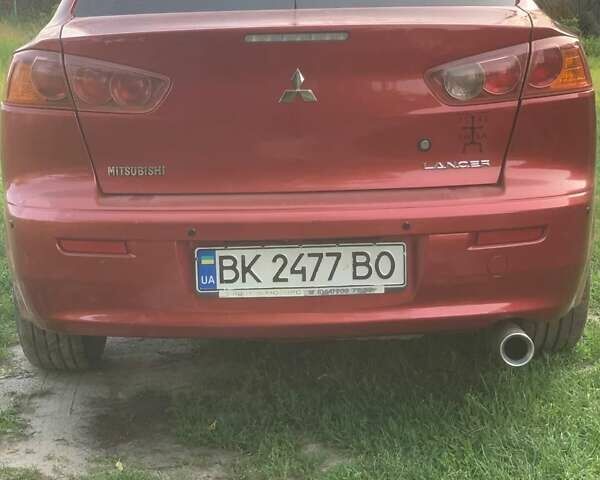 Красный Мицубиси Лансер, объемом двигателя 1.5 л и пробегом 270 тыс. км за 4999 $, фото 6 на Automoto.ua