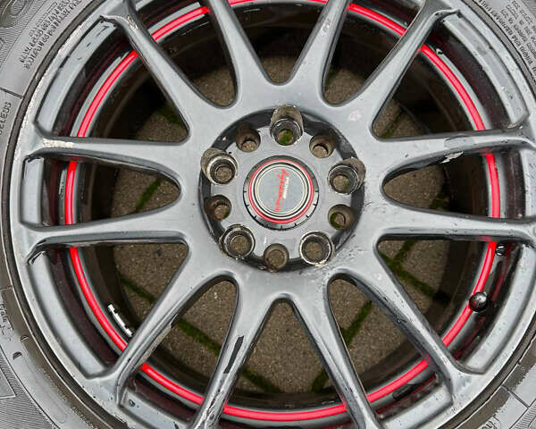 Красный Мицубиси Лансер, объемом двигателя 2 л и пробегом 143 тыс. км за 5200 $, фото 28 на Automoto.ua