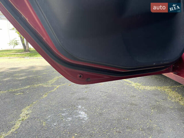 Червоний Міцубісі Lancer, об'ємом двигуна 1.6 л та пробігом 270 тис. км за 5699 $, фото 31 на Automoto.ua
