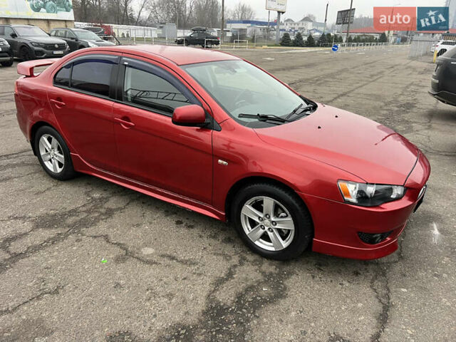Красный Мицубиси Лансер, объемом двигателя 2 л и пробегом 330 тыс. км за 5250 $, фото 4 на Automoto.ua