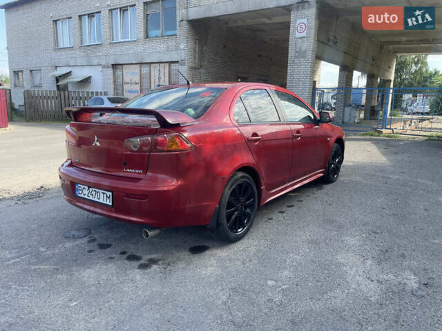 Червоний Міцубісі Lancer, об'ємом двигуна 2 л та пробігом 179 тис. км за 6499 $, фото 3 на Automoto.ua